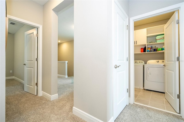 12259 Bracco St, Winter Garden, FL 34787 - corridor featuring washing machine and dryer, light carpet, and baseboards