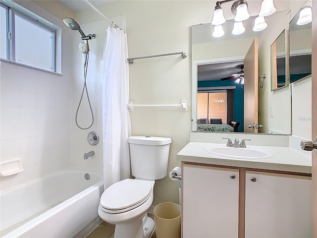 8704 Knightsbridge Ct Unit B, Kissimmee, FL 34747 - bathroom with shower / bathtub combination with curtain, vanity, toilet, a ceiling fan, and ensuite bathroom