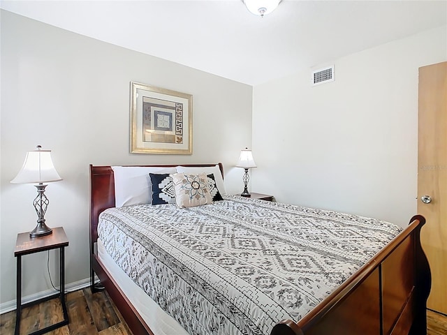 8704 Knightsbridge Ct Unit B, Kissimmee, FL 34747 - bedroom with dark wood finished floors and baseboards