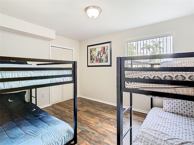 8704 Knightsbridge Ct Unit B, Kissimmee, FL 34747 - bedroom with wood finished floors and baseboards