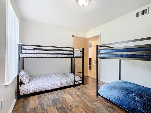 8704 Knightsbridge Ct Unit B, Kissimmee, FL 34747 - bedroom with wood finished floors and baseboards