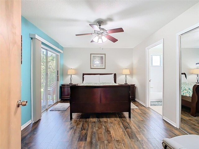 8704 Knightsbridge Ct Unit B, Kissimmee, FL 34747 - bedroom with dark wood-type flooring, access to exterior, baseboards, a ceiling fan, and ensuite bath