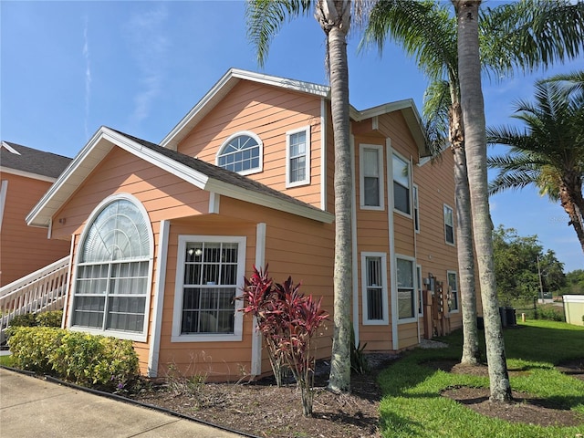 8704 Knightsbridge Ct Unit B, Kissimmee, FL 34747 - view of home's exterior with central AC unit