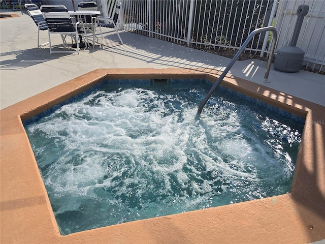 8704 Knightsbridge Ct Unit B, Kissimmee, FL 34747 - view of pool featuring an in-ground hot tub and a patio area