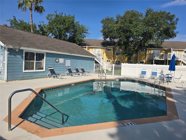 8704 Knightsbridge Ct Unit B, Kissimmee, FL 34747 - community pool featuring a patio