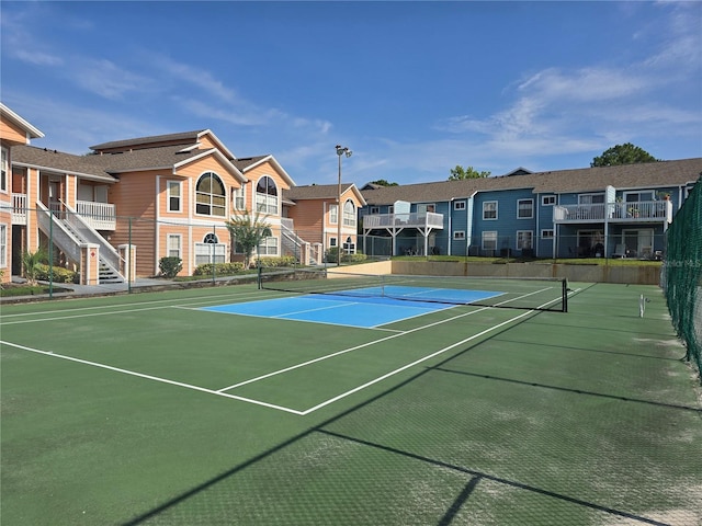 8704 Knightsbridge Ct Unit B, Kissimmee, FL 34747 - view of tennis court with a residential view