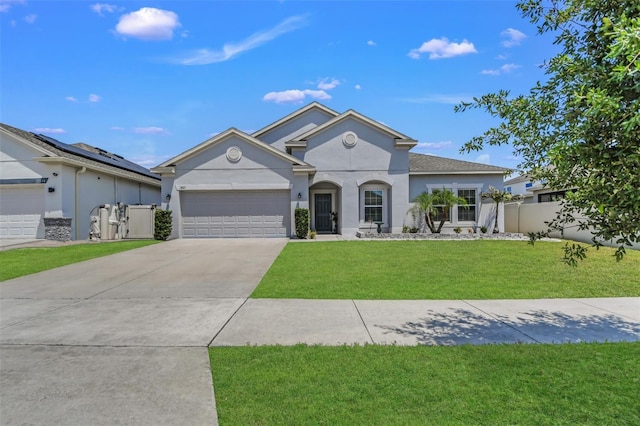 1821 Benevento St, Saint Cloud, FL 34771 - view of front facade featuring stucco siding, driveway, and a garage