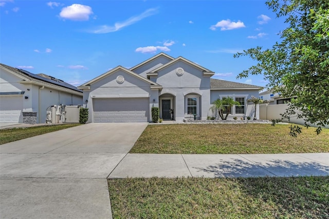 1821 Benevento St, Saint Cloud, FL 34771 - view of front facade with stucco siding, concrete driveway, and an attached garage