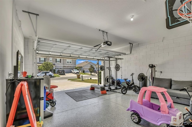 1821 Benevento St, Saint Cloud, FL 34771 - garage with concrete block wall and a garage door opener