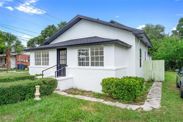 161 Bolender Rd, Auburndale, FL 33823 - view of front of property featuring stucco siding and roof with shingles
