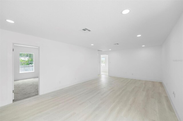 161 Bolender Rd, Auburndale, FL 33823 - empty room with recessed lighting, light wood-type flooring, and baseboards