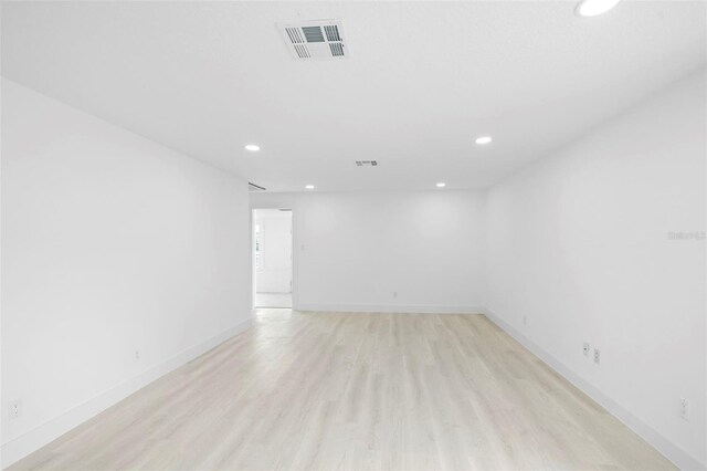 161 Bolender Rd, Auburndale, FL 33823 - spare room featuring recessed lighting, light wood finished floors, and baseboards