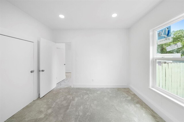 161 Bolender Rd, Auburndale, FL 33823 - unfurnished bedroom with light carpet and recessed lighting