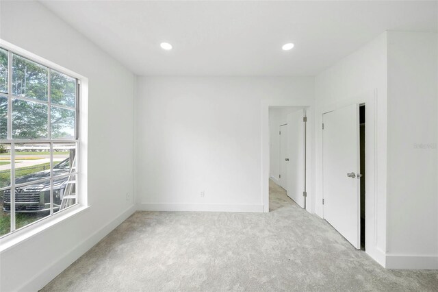 161 Bolender Rd, Auburndale, FL 33823 - spare room featuring light carpet, baseboards, and recessed lighting