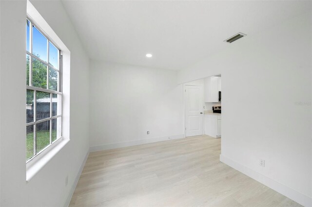 161 Bolender Rd, Auburndale, FL 33823 - spare room featuring light wood-style floors, baseboards, and recessed lighting