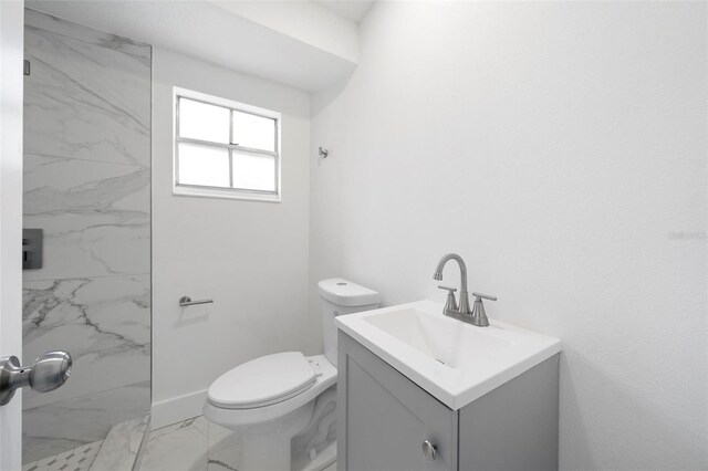 161 Bolender Rd, Auburndale, FL 33823 - bathroom featuring marble finish flooring, vanity, toilet, and a marble finish shower