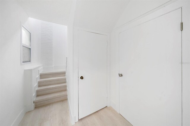 161 Bolender Rd, Auburndale, FL 33823 - corridor featuring light wood finished floors and lofted ceiling