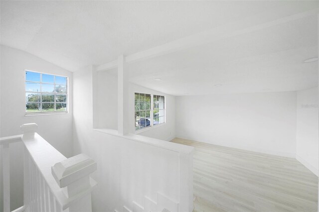 161 Bolender Rd, Auburndale, FL 33823 - stairway featuring vaulted ceiling, wood finished floors, and healthy amount of natural light