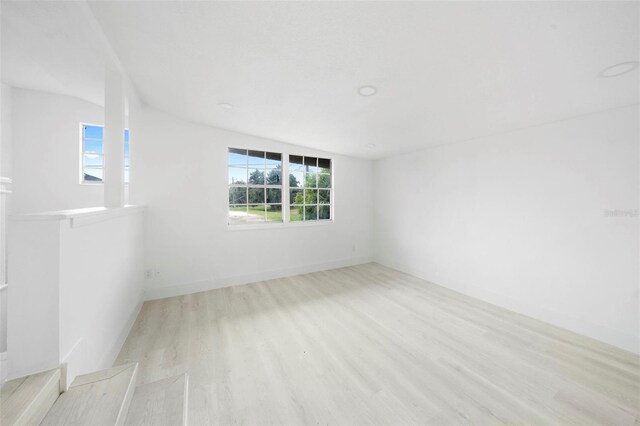 161 Bolender Rd, Auburndale, FL 33823 - spare room with wood finished floors and plenty of natural light