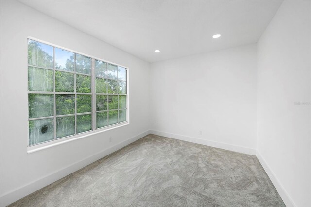 161 Bolender Rd, Auburndale, FL 33823 - unfurnished room featuring carpet, baseboards, and recessed lighting