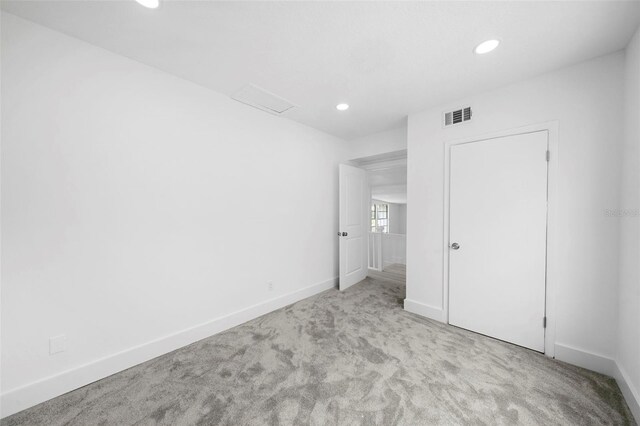 161 Bolender Rd, Auburndale, FL 33823 - unfurnished bedroom with carpet flooring, baseboards, and recessed lighting