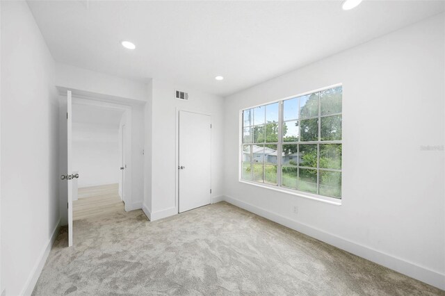 161 Bolender Rd, Auburndale, FL 33823 - unfurnished bedroom with carpet flooring, baseboards, and recessed lighting