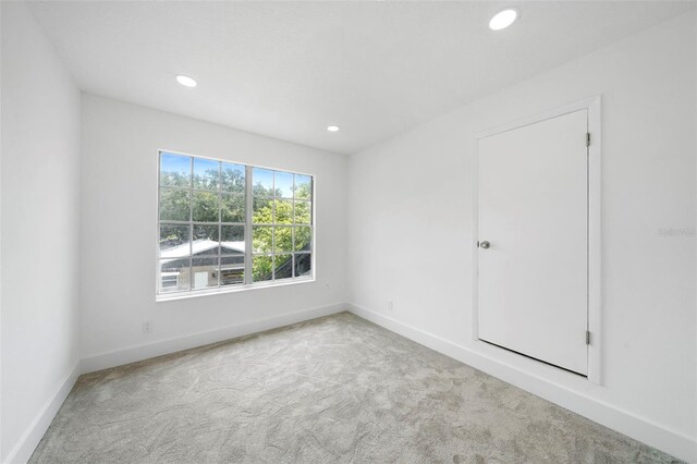 161 Bolender Rd, Auburndale, FL 33823 - spare room with carpet, baseboards, and recessed lighting