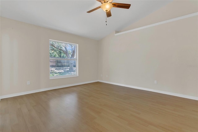 3014 Linmont Ln, Eustis, FL 32726 - unfurnished room with lofted ceiling, light wood-type flooring, a ceiling fan, and baseboards
