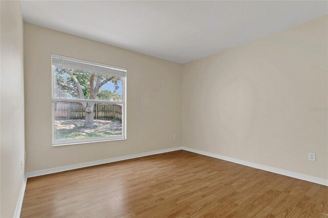 3014 Linmont Ln, Eustis, FL 32726 - empty room featuring wood finished floors and baseboards