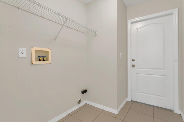 3014 Linmont Ln, Eustis, FL 32726 - washroom featuring washer hookup, baseboards, light tile patterned floors, and electric dryer hookup