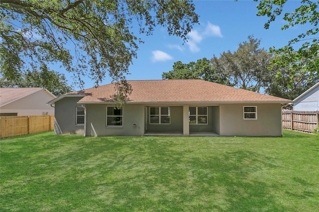 3014 Linmont Ln, Eustis, FL 32726 - rear view of house with stucco siding and a patio