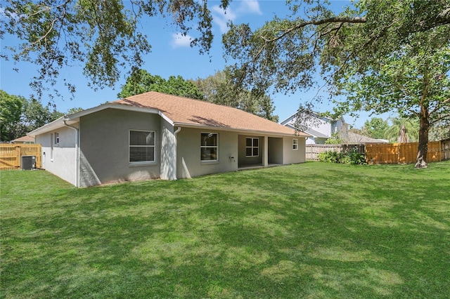 3014 Linmont Ln, Eustis, FL 32726 - back of house with stucco siding and central AC