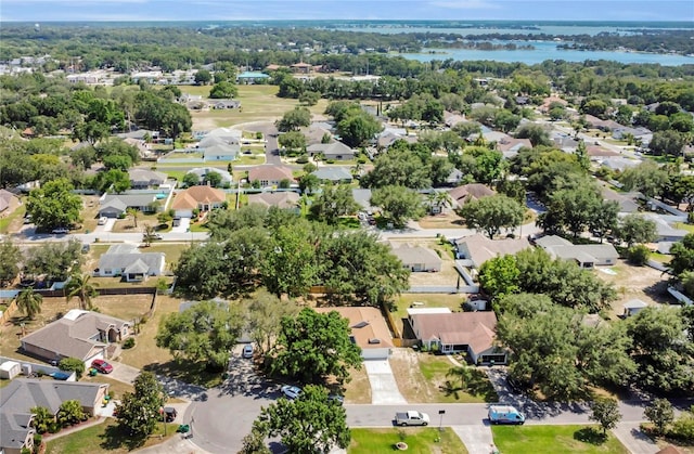 3014 Linmont Ln, Eustis, FL 32726 - aerial perspective of suburban area with a nearby body of water