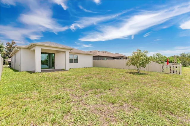 3953 Baja Dr, Saint Cloud, FL 34772 - back of house with stucco siding