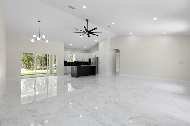 13619 SW 78th Pl, Dunnellon, FL 34432 - unfurnished living room with arched walkways, light marble finish floors, high vaulted ceiling, a ceiling fan, and recessed lighting