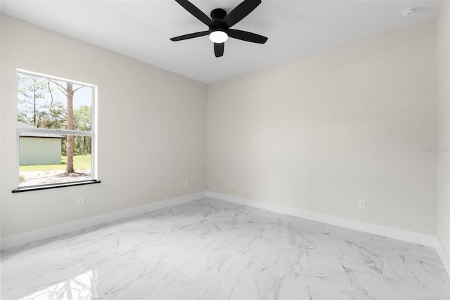13619 SW 78th Pl, Dunnellon, FL 34432 - spare room featuring a smoke detector, marble finish flooring, and ceiling fan