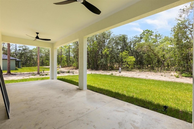 13619 SW 78th Pl, Dunnellon, FL 34432 - view of patio / terrace featuring a ceiling fan and view of wooded area
