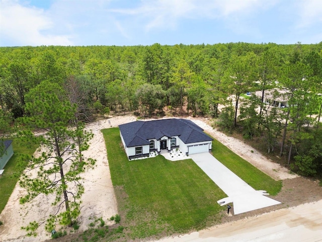13619 SW 78th Pl, Dunnellon, FL 34432 - aerial view of property and surrounding area with a heavily wooded area