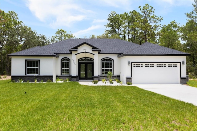 13619 SW 78th Pl, Dunnellon, FL 34432 - french country style house with french doors, stucco siding, a garage, and driveway