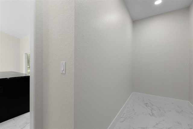 13619 SW 78th Pl, Dunnellon, FL 34432 - laundry room featuring light marble finish floors and recessed lighting