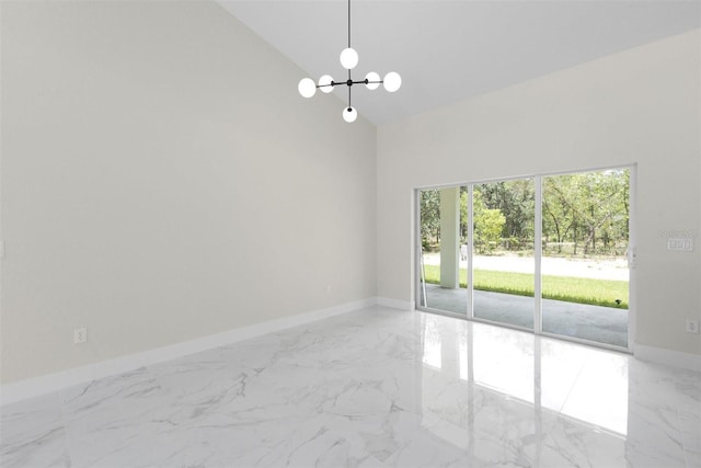 13619 SW 78th Pl, Dunnellon, FL 34432 - spare room with marble finish floors, high vaulted ceiling, and a chandelier