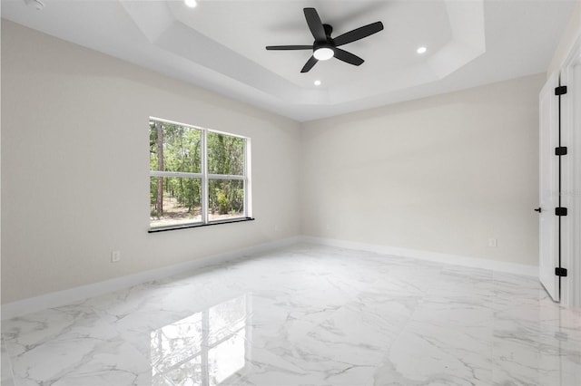13619 SW 78th Pl, Dunnellon, FL 34432 - unfurnished room featuring recessed lighting, a tray ceiling, ceiling fan, and marble finish floors