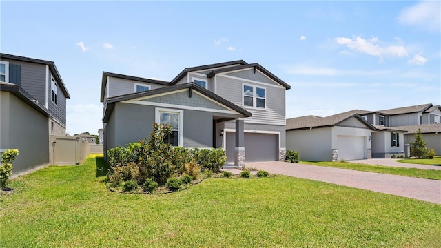 5291 Meredrew Ln, Saint Cloud, FL 34771 - view of front of home with decorative driveway, a front lawn, stucco siding, and an attached garage