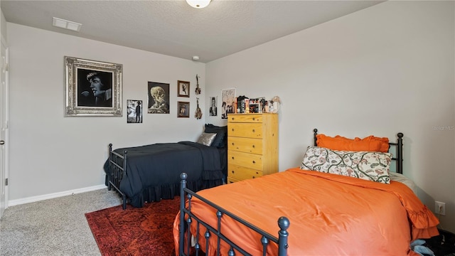 5291 Meredrew Ln, Saint Cloud, FL 34771 - carpeted bedroom with baseboards and a textured ceiling