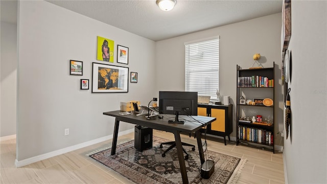 5291 Meredrew Ln, Saint Cloud, FL 34771 - office featuring baseboards and a textured ceiling