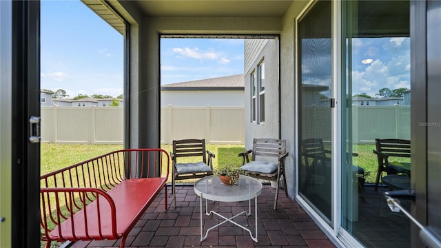 5291 Meredrew Ln, Saint Cloud, FL 34771 - sunroom with brick flooring and wainscoting