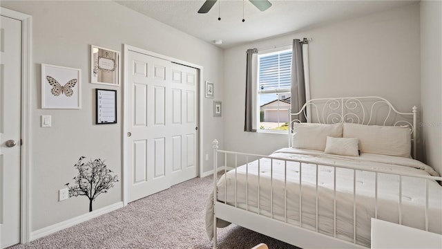 5291 Meredrew Ln, Saint Cloud, FL 34771 - carpeted bedroom featuring baseboards, a closet, and a ceiling fan