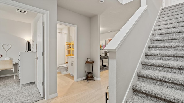 5291 Meredrew Ln, Saint Cloud, FL 34771 - staircase featuring baseboards