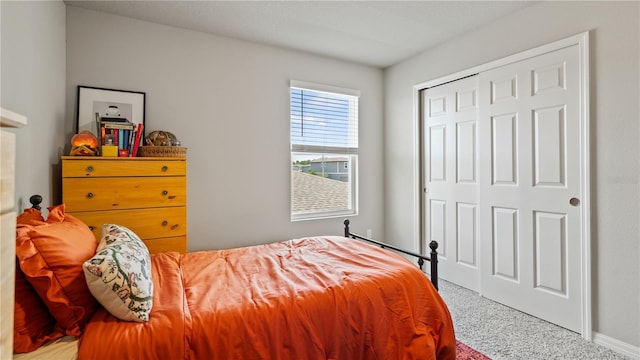 5291 Meredrew Ln, Saint Cloud, FL 34771 - bedroom featuring carpet flooring, a closet, and baseboards