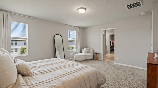 5291 Meredrew Ln, Saint Cloud, FL 34771 - bedroom featuring carpet flooring, baseboards, and a textured ceiling